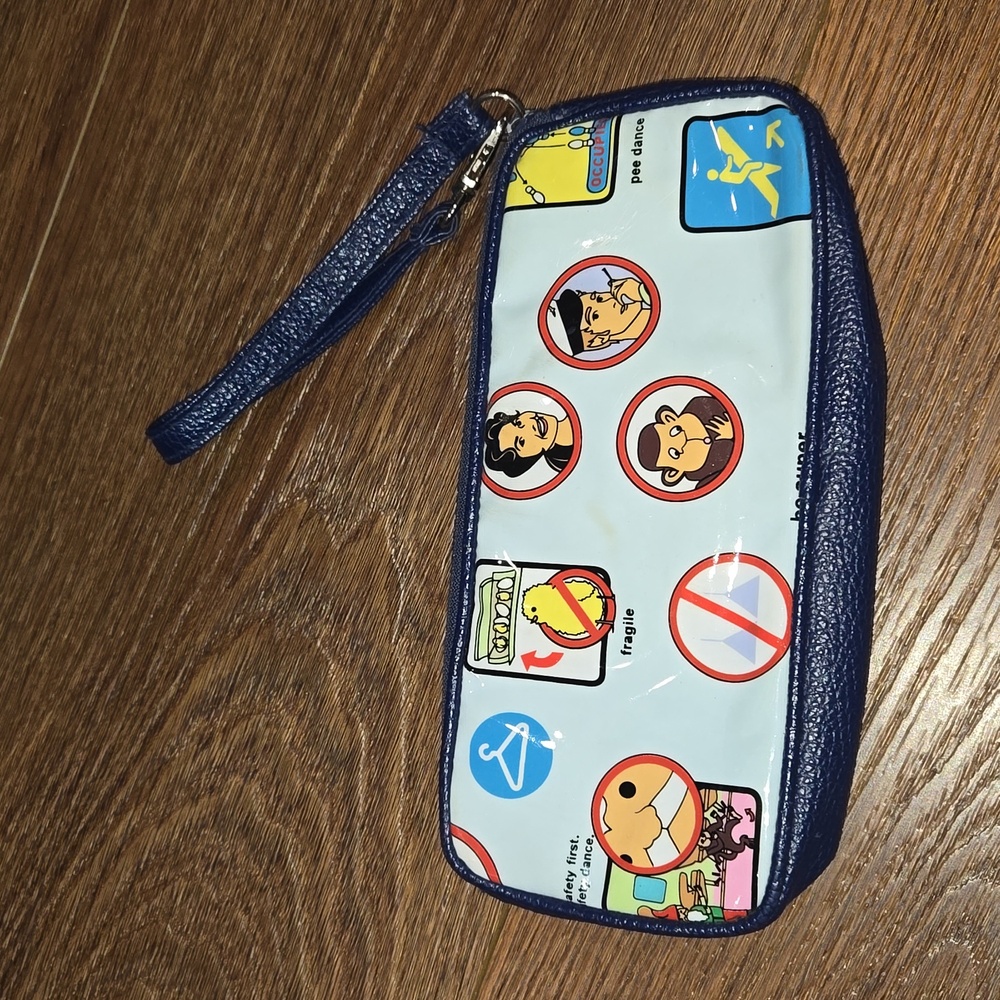TRANS VERSION MAKEUP POUCH WRISTLET.   #6140